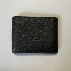 Louis Vuitton Slender Wallet Black Taurillon leather embossed 8 credit card slot